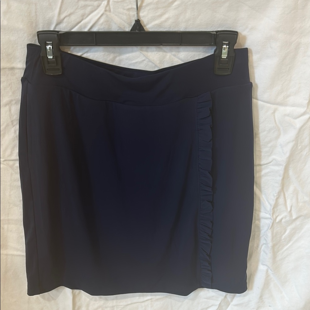 Elegant Navy Blue skort by Chico’s.  Cute side ruffle.  Worn once.